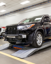 Toyota on vehicle lift | Vann York Collision Center in Hight Point NC
